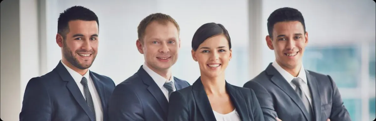 Team of smiling real estate agents