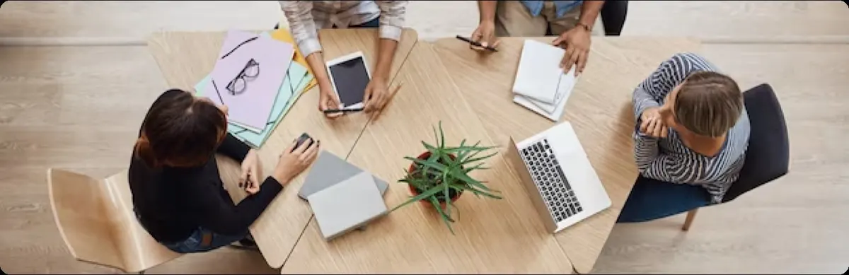 Colleagues collaborating around a table