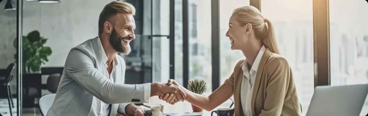 Agents shaking hands in a meeting